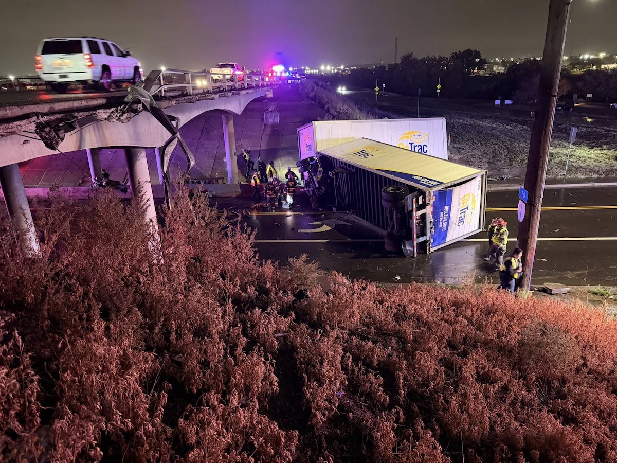 Dog still missing after driver hauling doubles survives crash off Colorado overpass