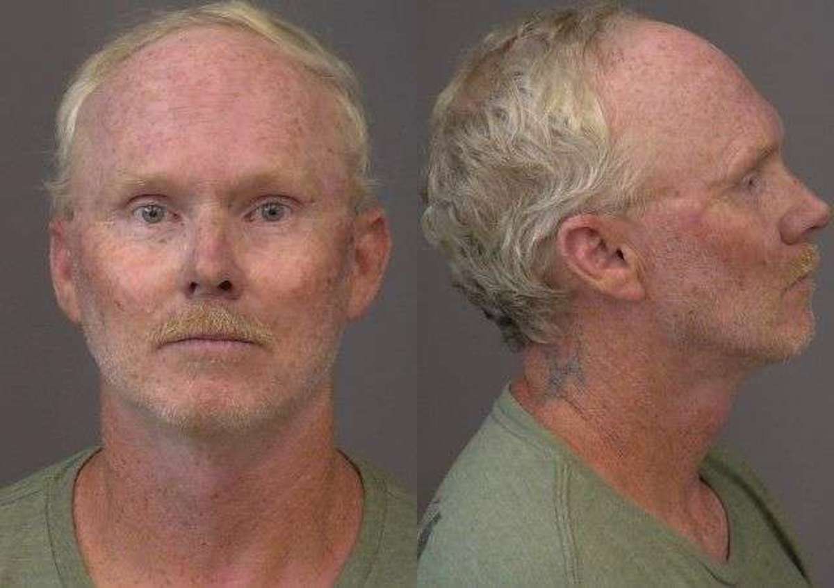 Driver arrested for strapping up in middle of road and wielding pipe at motorist trying to get around