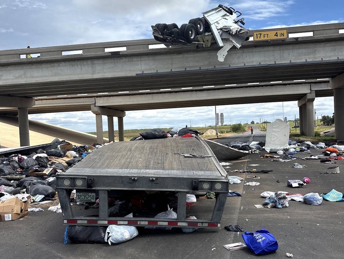 “Shoe or two” hucked at cars speeding by after tractor trailer crash leaves bags of clothing donations along roadway, police joke