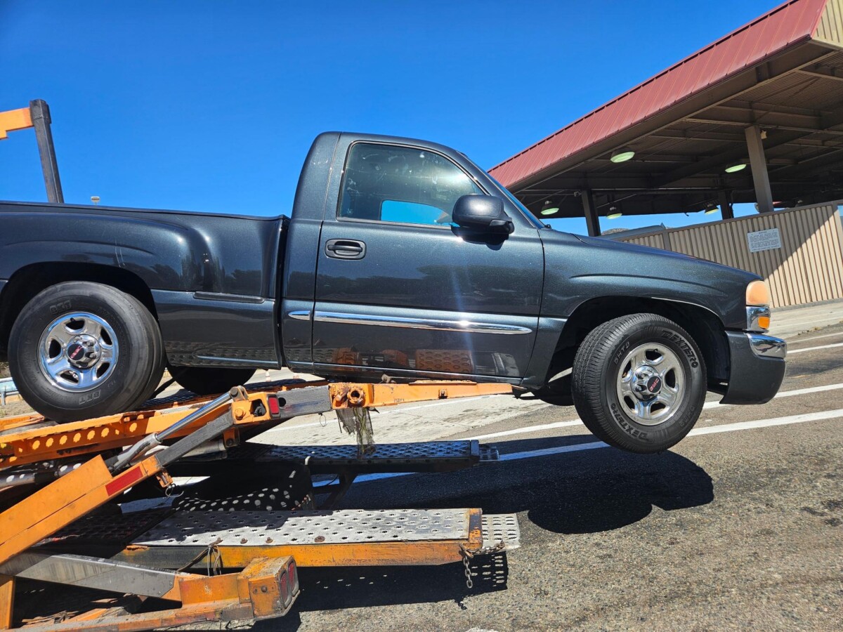 CHP puts car carrier out-of-service for dangling pickup truck