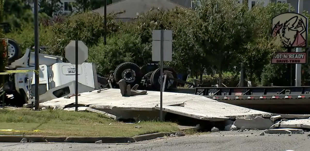 Sign spinner dead after tractor trailer lands on him in crash with propane truck