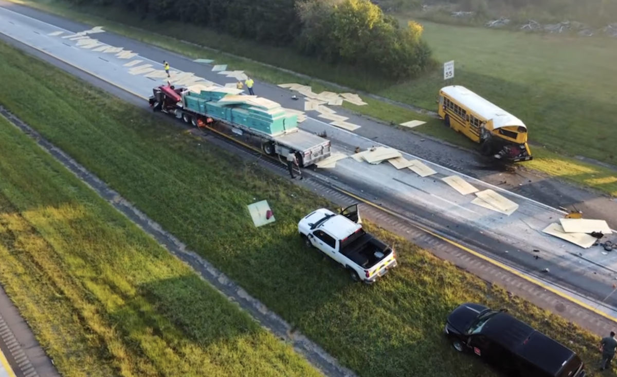 Semi truck slams into school bus as first kids of the day climb aboard