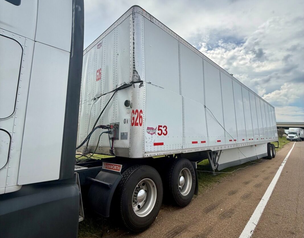 'Straight out of a movie' - Big rigs snagged by utility wire downed by ...