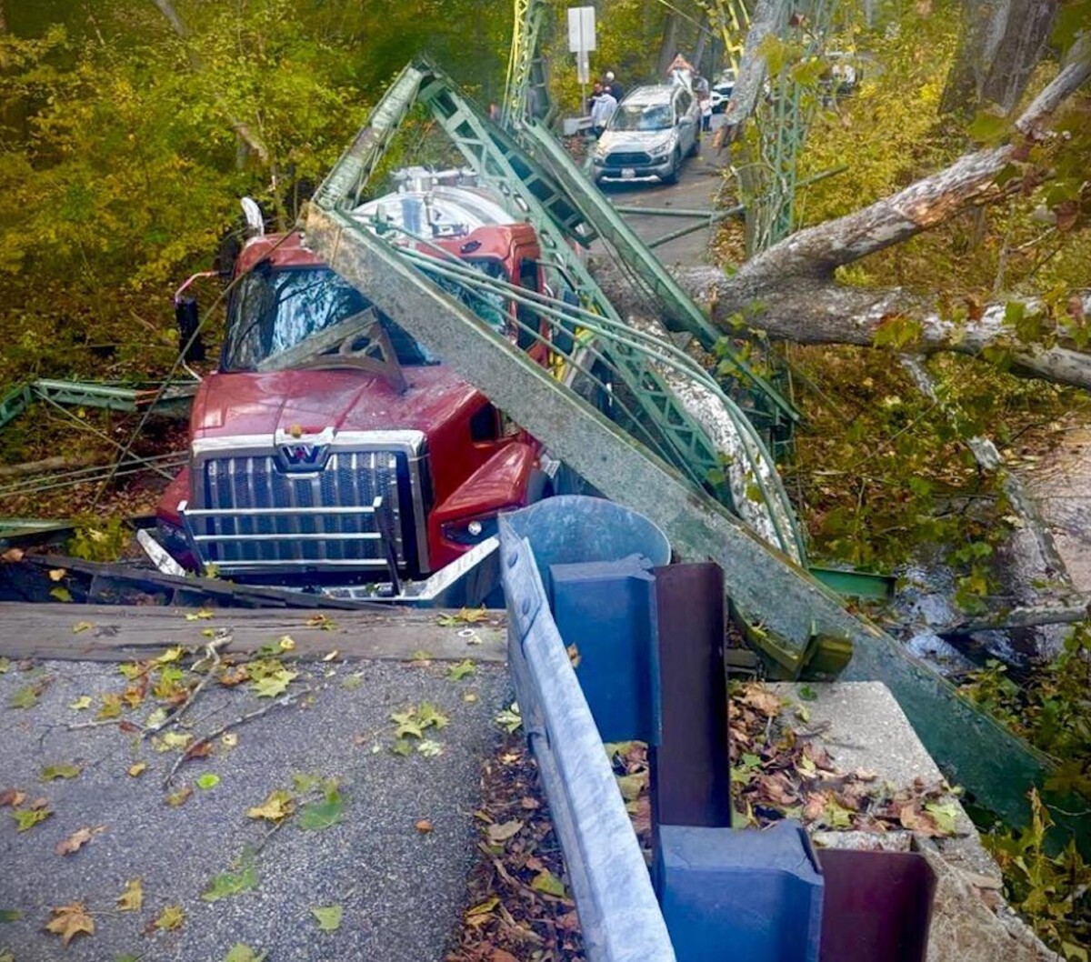 Maryland police investigating after bridge collapses under septic truck