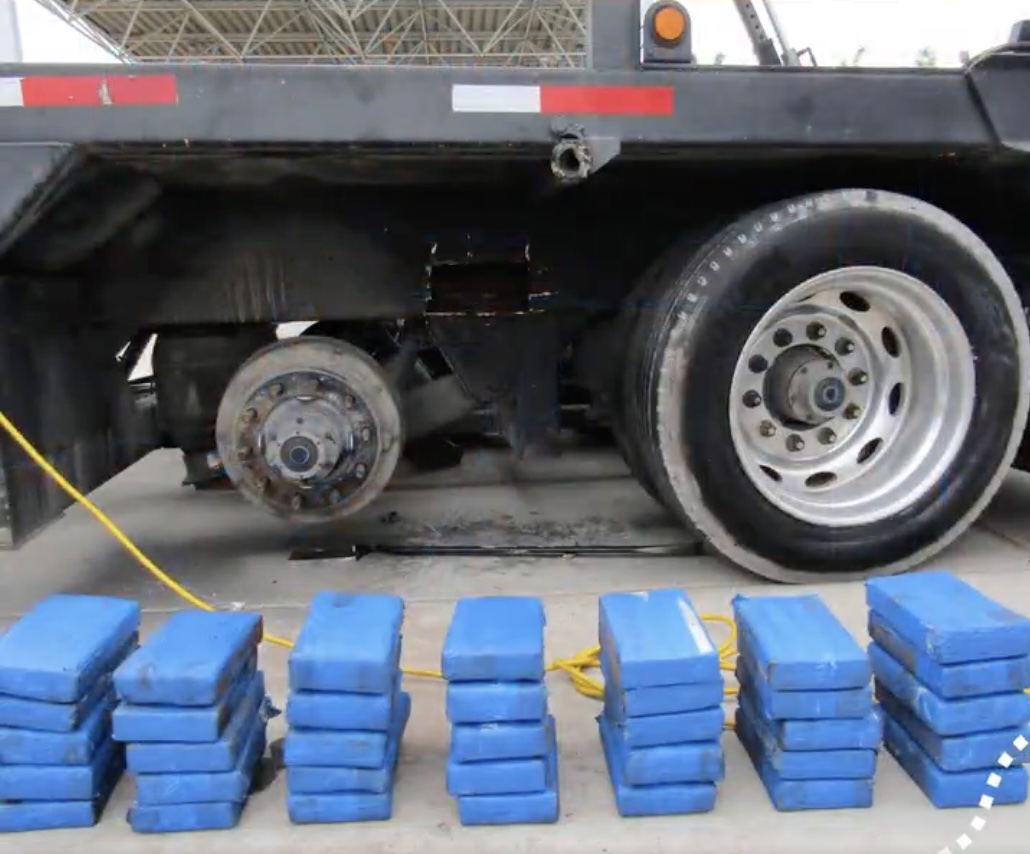 Truck driver’s visa cancelled after officers find 185 pounds of cocaine hidden in metal beams of car hauler trailer