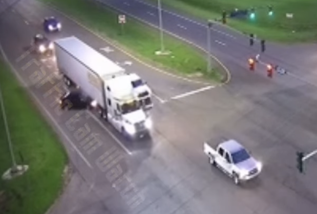 VIDEO: Motorist smashed into truck stopped at intersection but driver never knew what hit him