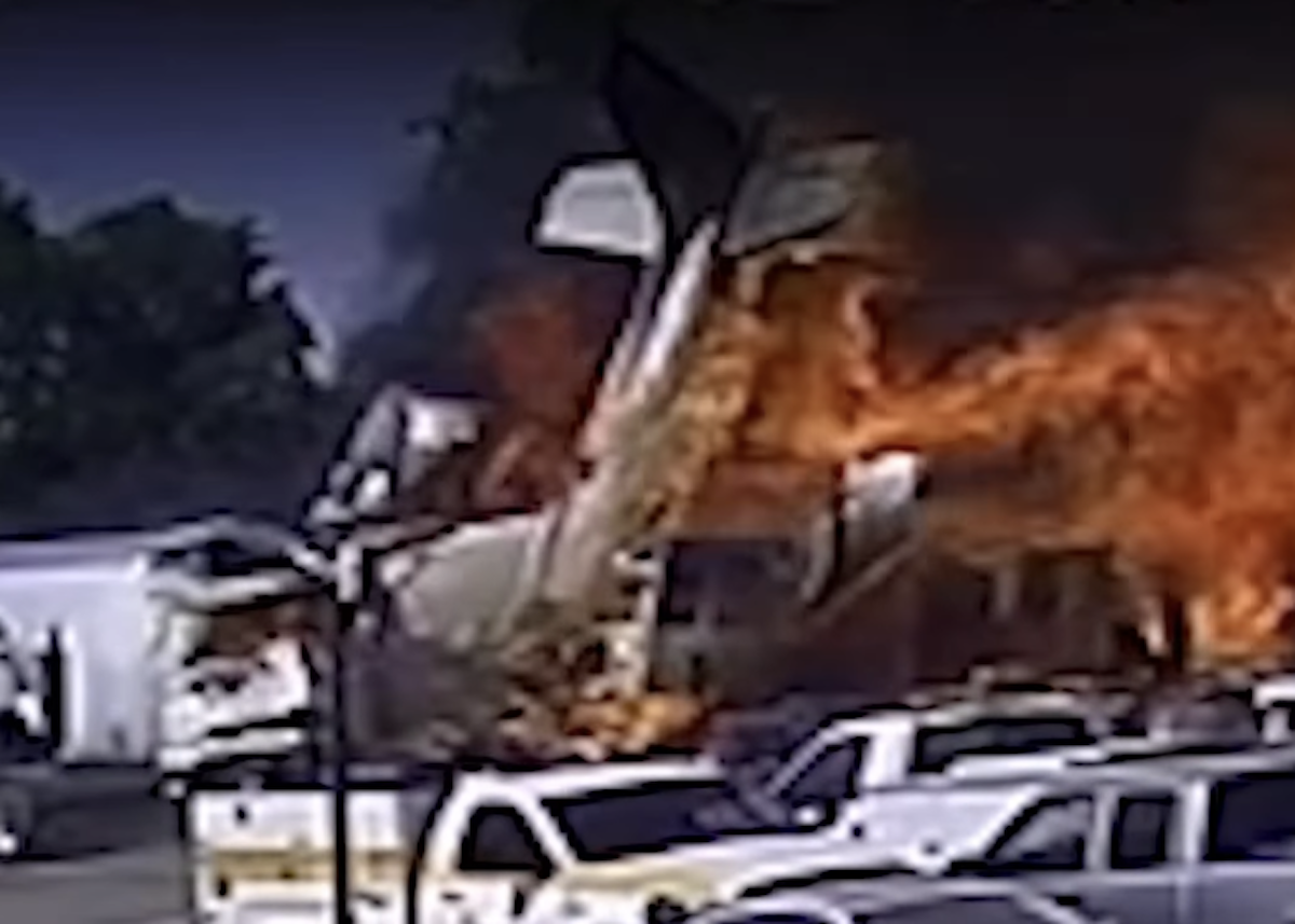 Small plane crashes into line of parked tractor trailers in fatal incident