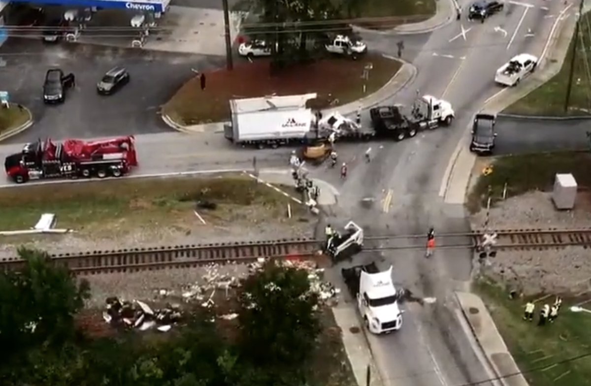 Watch the moment a train plowed into a semi truck in Georgia from multiple angles