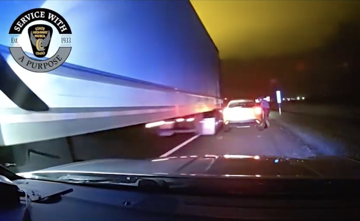Ohio troopers share video of semi truck’s move over violation that sheared mirror off car during traffic stop