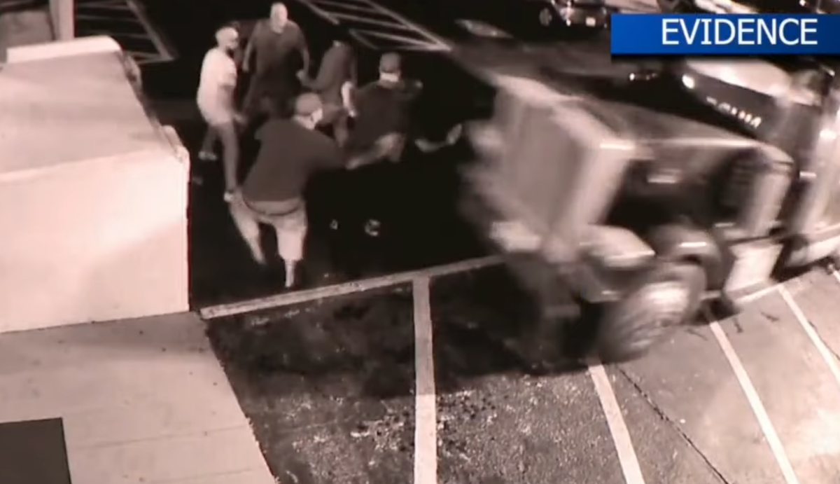 Dash cam footage of trucker driving into group of people outside of strip club shown during jury trial