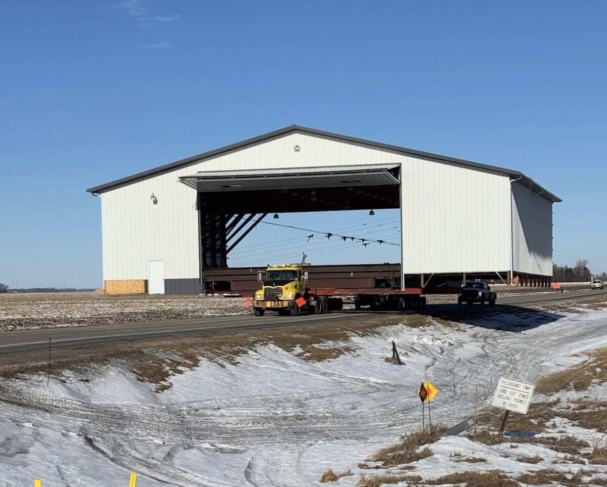 North Dakota troopers escort semi truck hauling 81 foot wide building on five mile journey