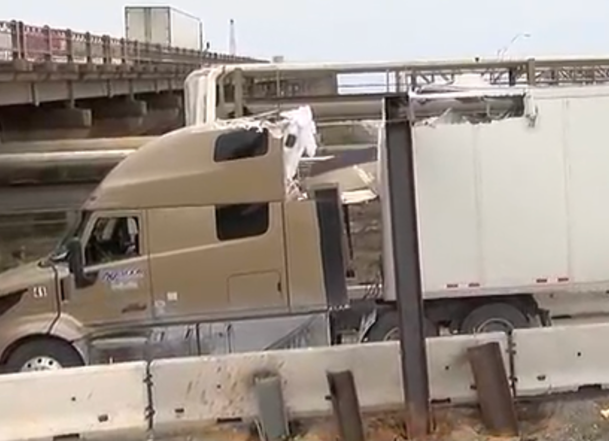 Semi truck smacks into bridge height crash bar hours after installation