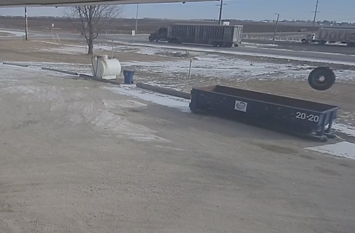 Video shows passing semi truck’s tires make one-in-a-million landing in dumpster