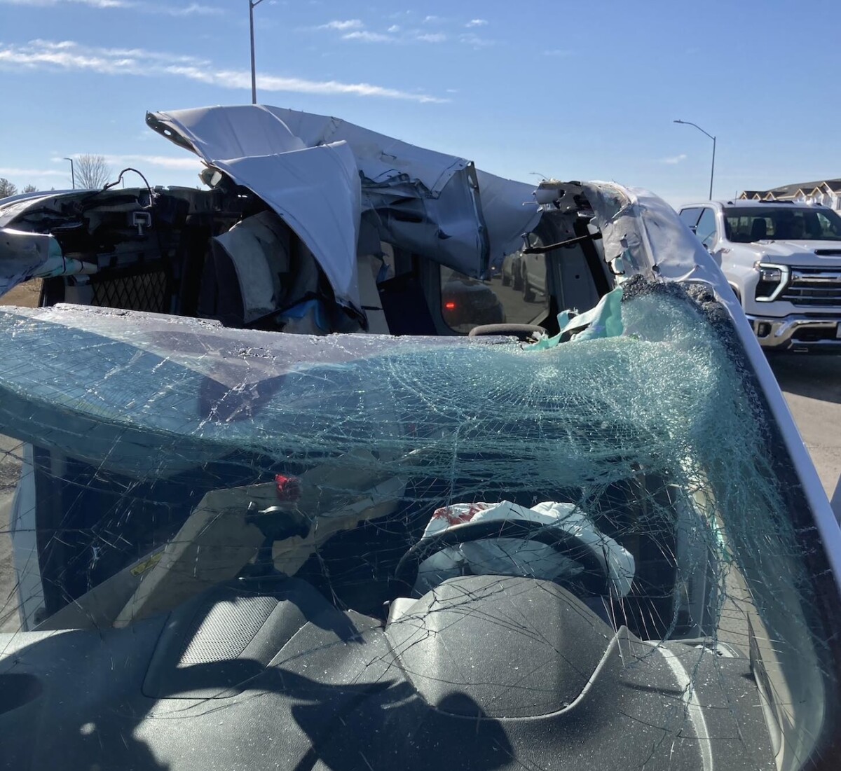 Car severely damaged after crashing into commercial vehicle’s legally marked oversized load, Iowa troopers say