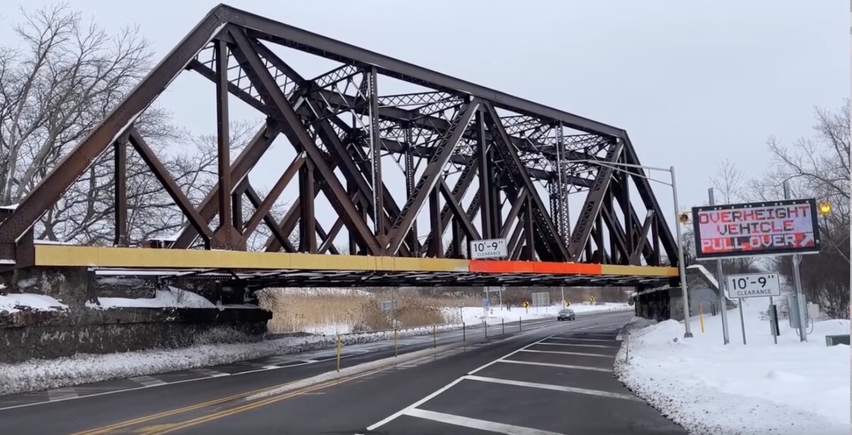New York rolls out flashing signs and more to stop trucks from hitting low-clearance Parkway bridge