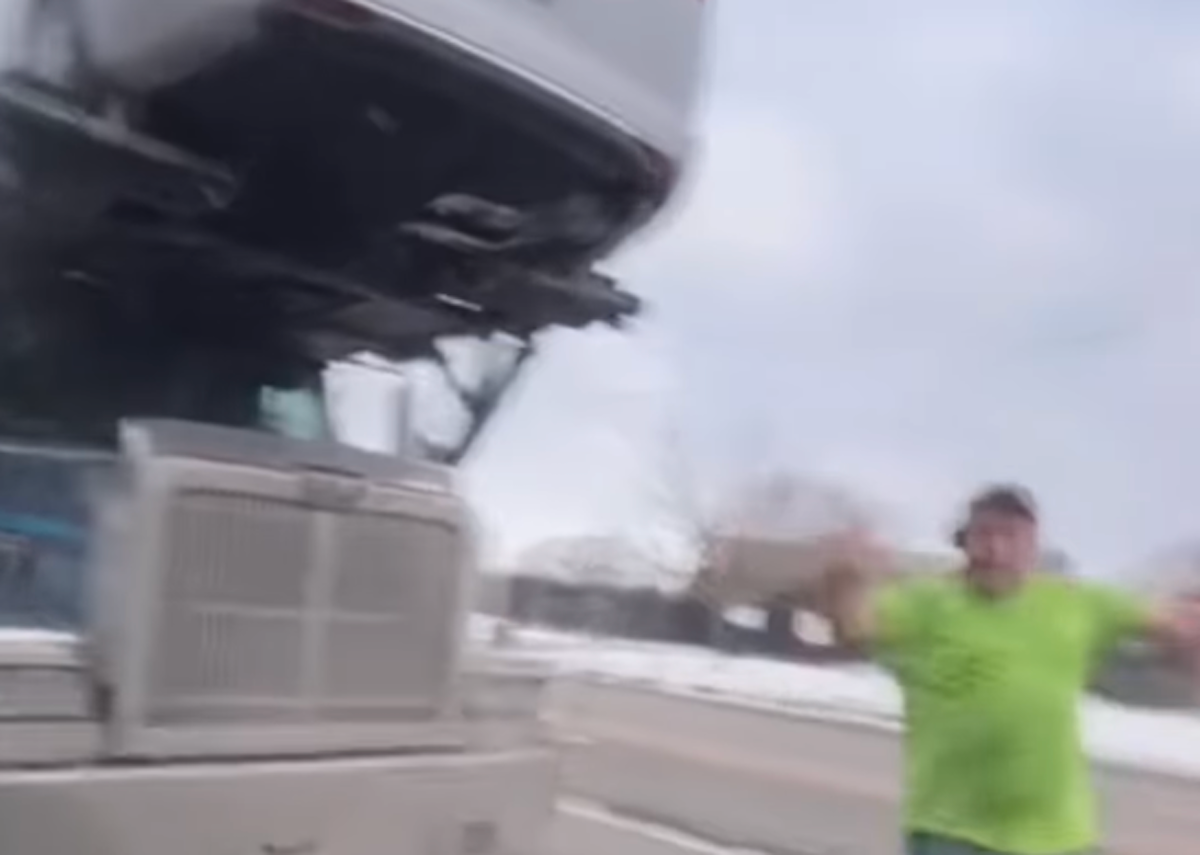 Car hauler filmed charging towards four wheeler after apparent Detroit road rage incident