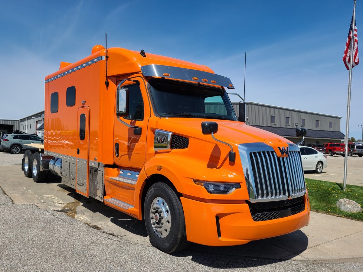 Get a closer look inside this eye-catching tangerine Western Star 57X with 156″ ARI Legacy Sleeper