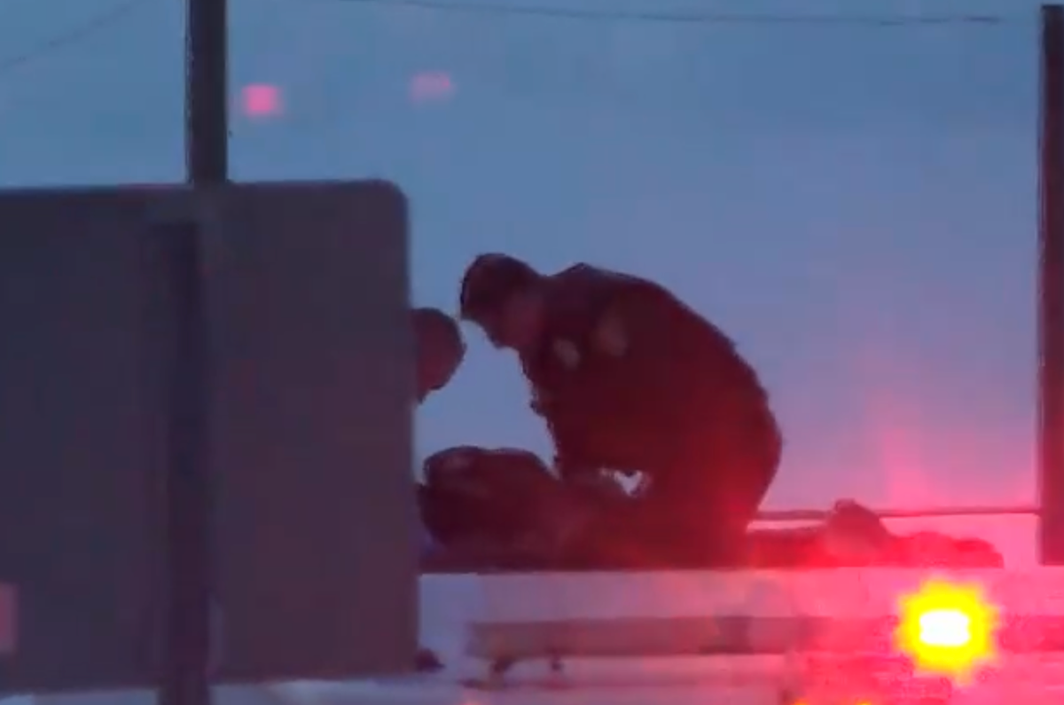 Man arrested for jumping up and down on semi, fire truck