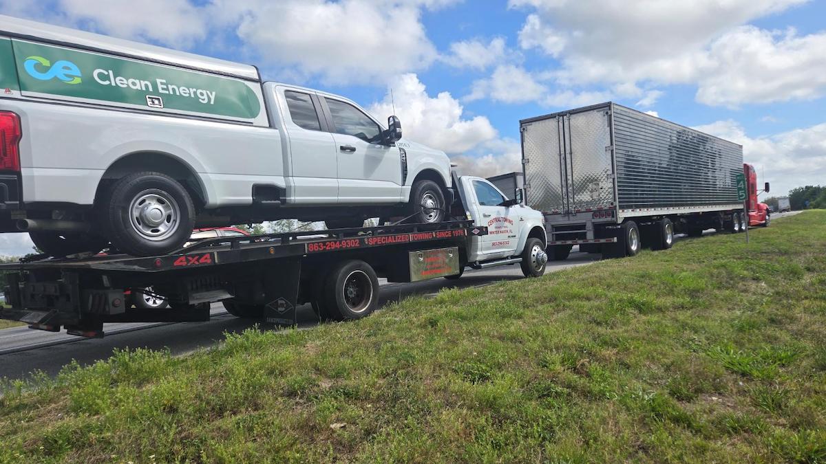 Three people arrested in roadside road rage fight involving tow truck, semi truck