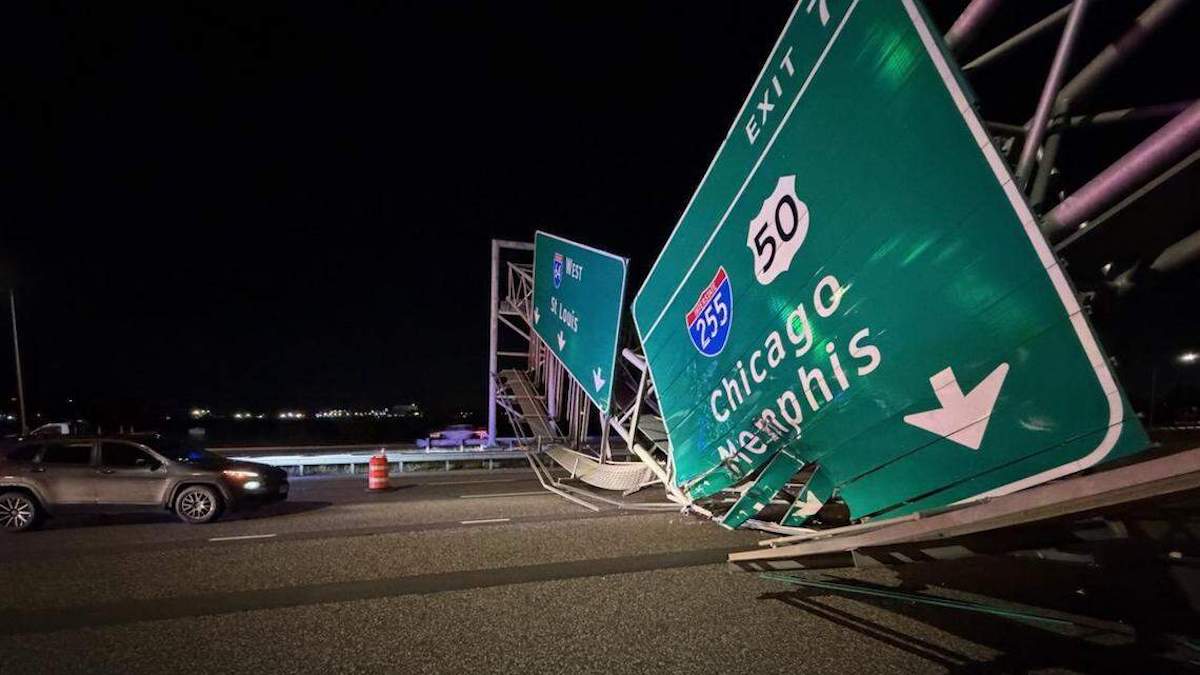 Raised dump bed takes out highway sign, shutting down I-64 overnight