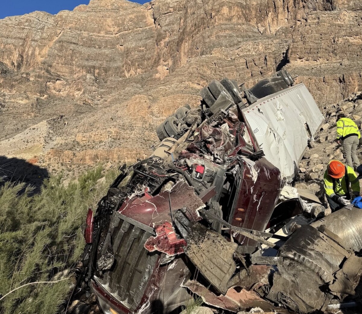 Truck driver survives crash off I-15 into ravine, Arizona firefighters say