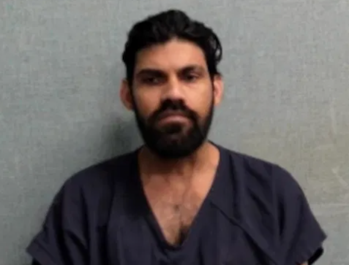 Truck driver detained by ICE pleaded not guilty to manslaughter in crash that killed newlyweds