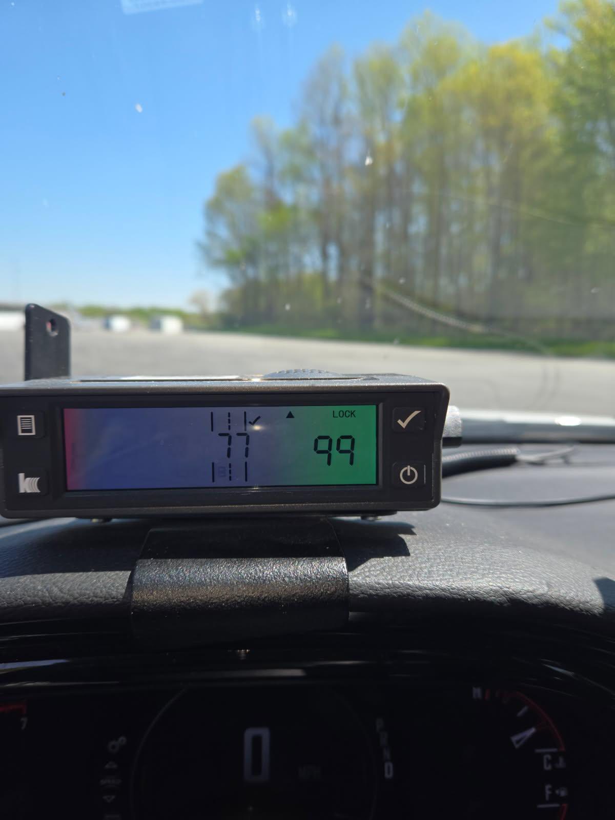 ISP image of speed violation performed by pickup driver hauling trailer. 