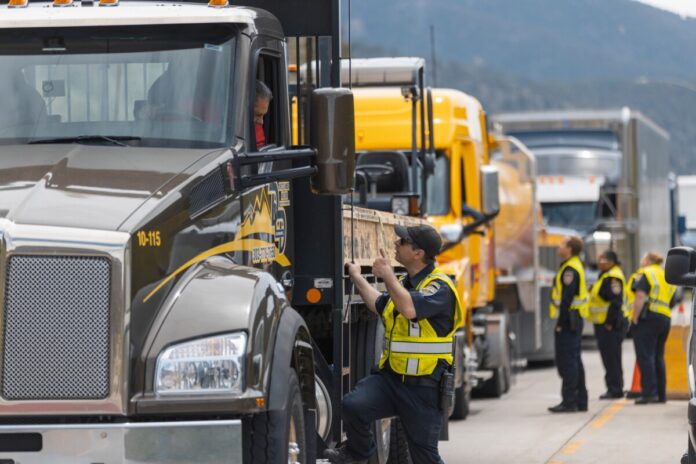 Colorado DOT image of CMVs in chain check operation