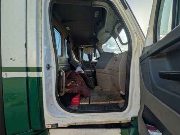 CHP officer stops speeding semi truck, finds no CDL and unrestrained passenger sitting on floorboard