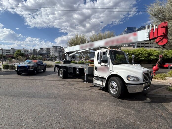 AZDPS AZDPS image of crane truck with no CDL driver operating
