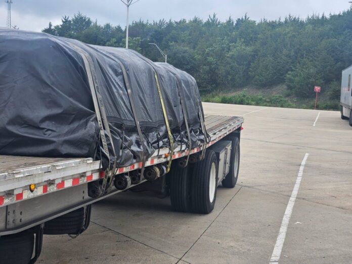 THP photo of overweight load with cracked trailer frame