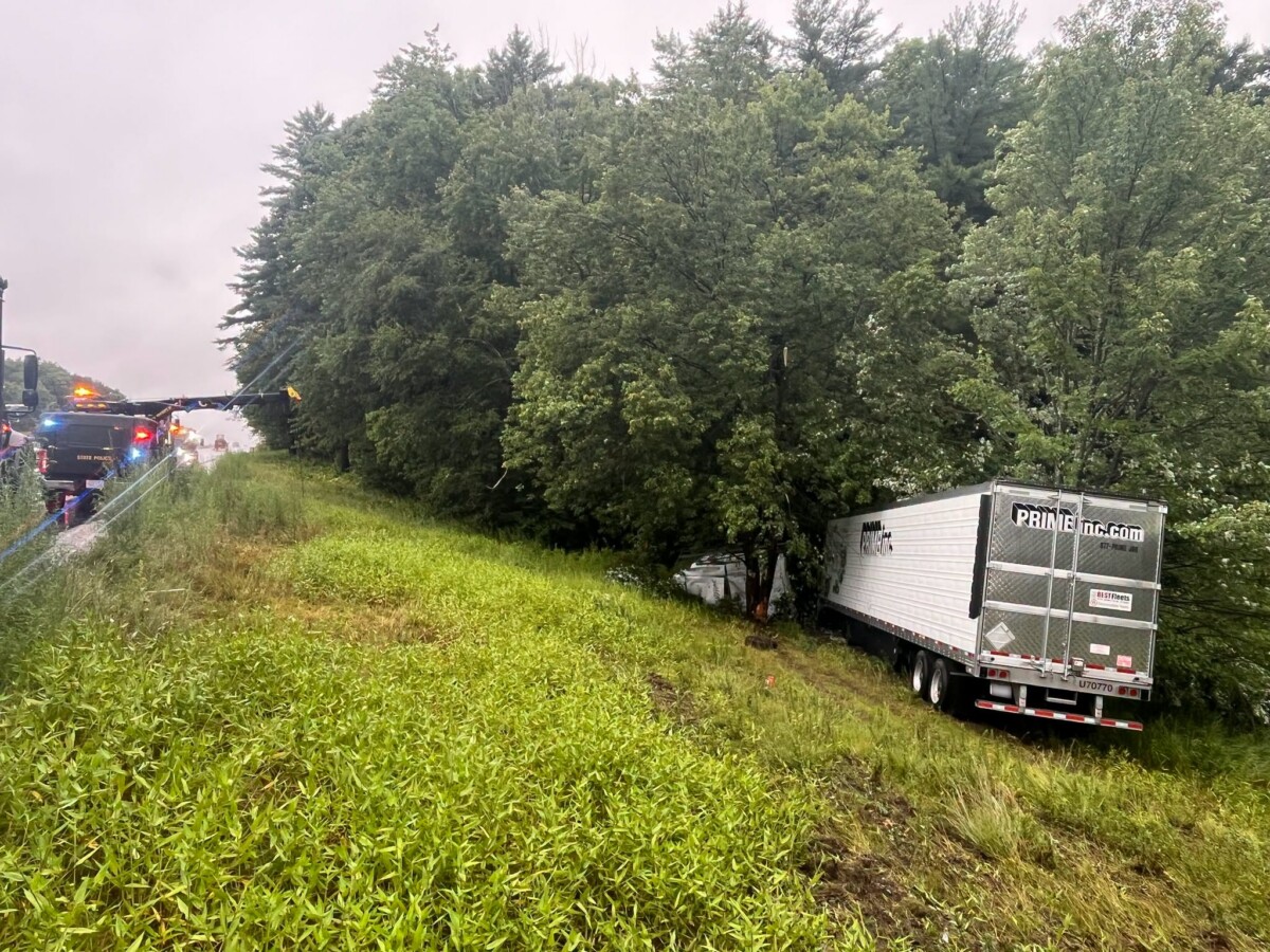 Motorist cited after crash sent brand-new Freightliner into woods, New Hampshire troopers say