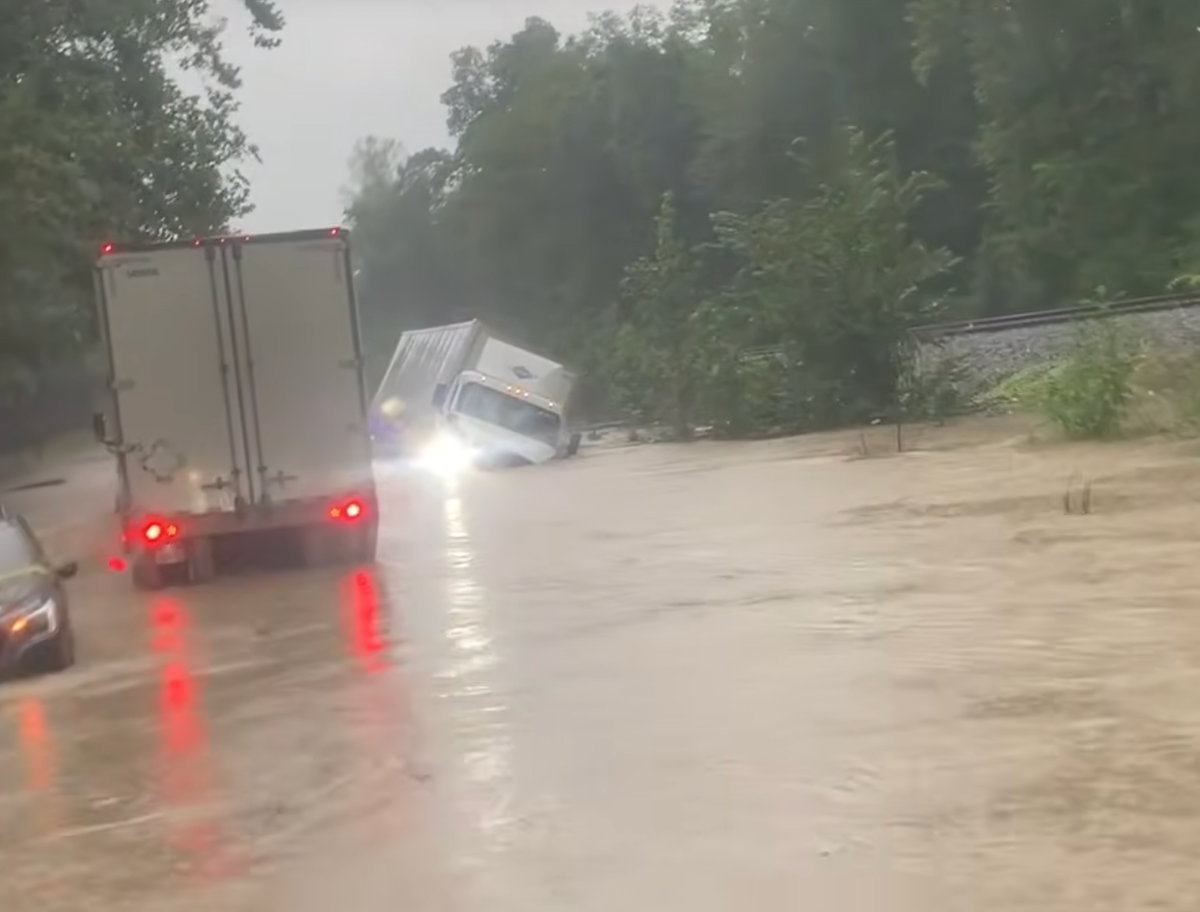 Watch as Indiana flooding swallows semi truck