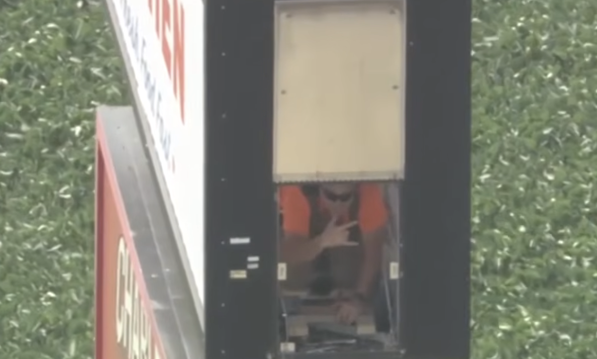 Man gets stuck inside truck stop sign during service call