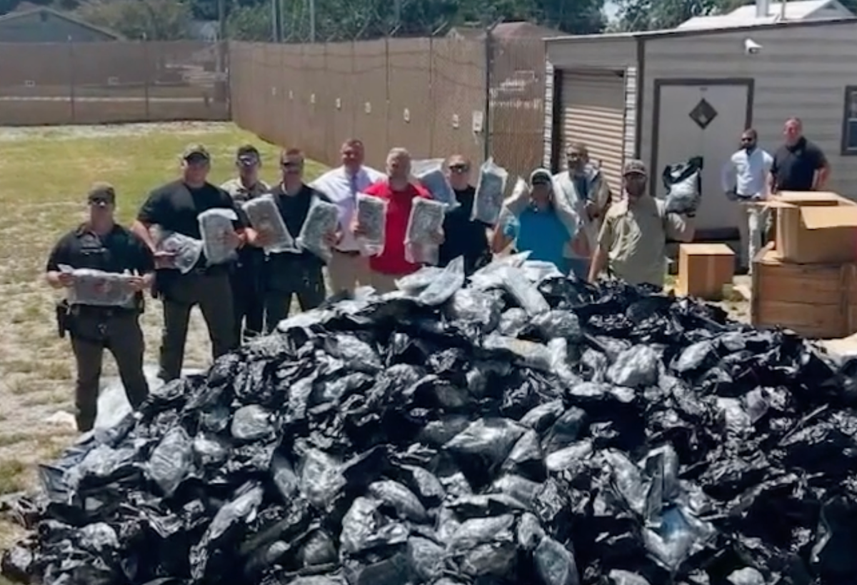 Truck driver calls 911 on own load after load shift reveals packages of marijuana