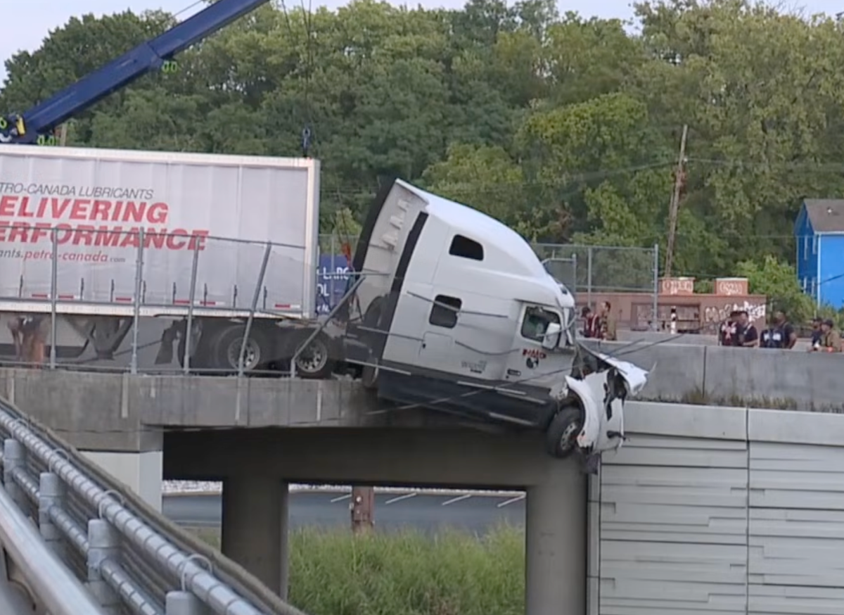 Semi truck brake failure leaves cab hanging off I-71 ramp