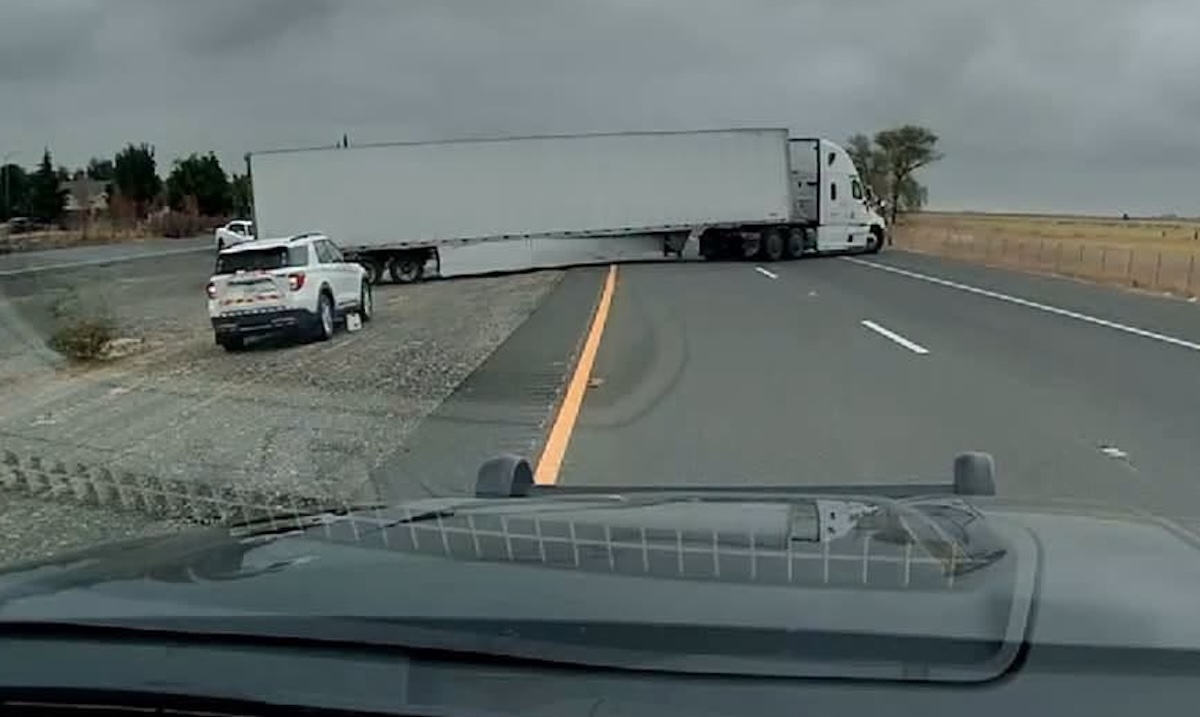 Semi truck ruptures own air line attempting u-turn through I-5 median 